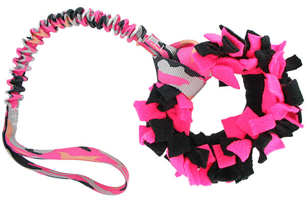 Bungee tug attached to a toy (not included)