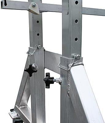 Close-up of knobs and clips for adjusting dogwalk height